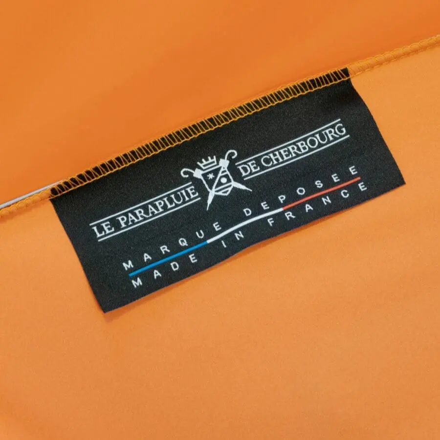 orange-umbrella-claw-The-umbrella-of-cherbourg