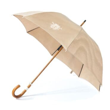 le parapluie de cherbourg, a moiré collector's item in beige